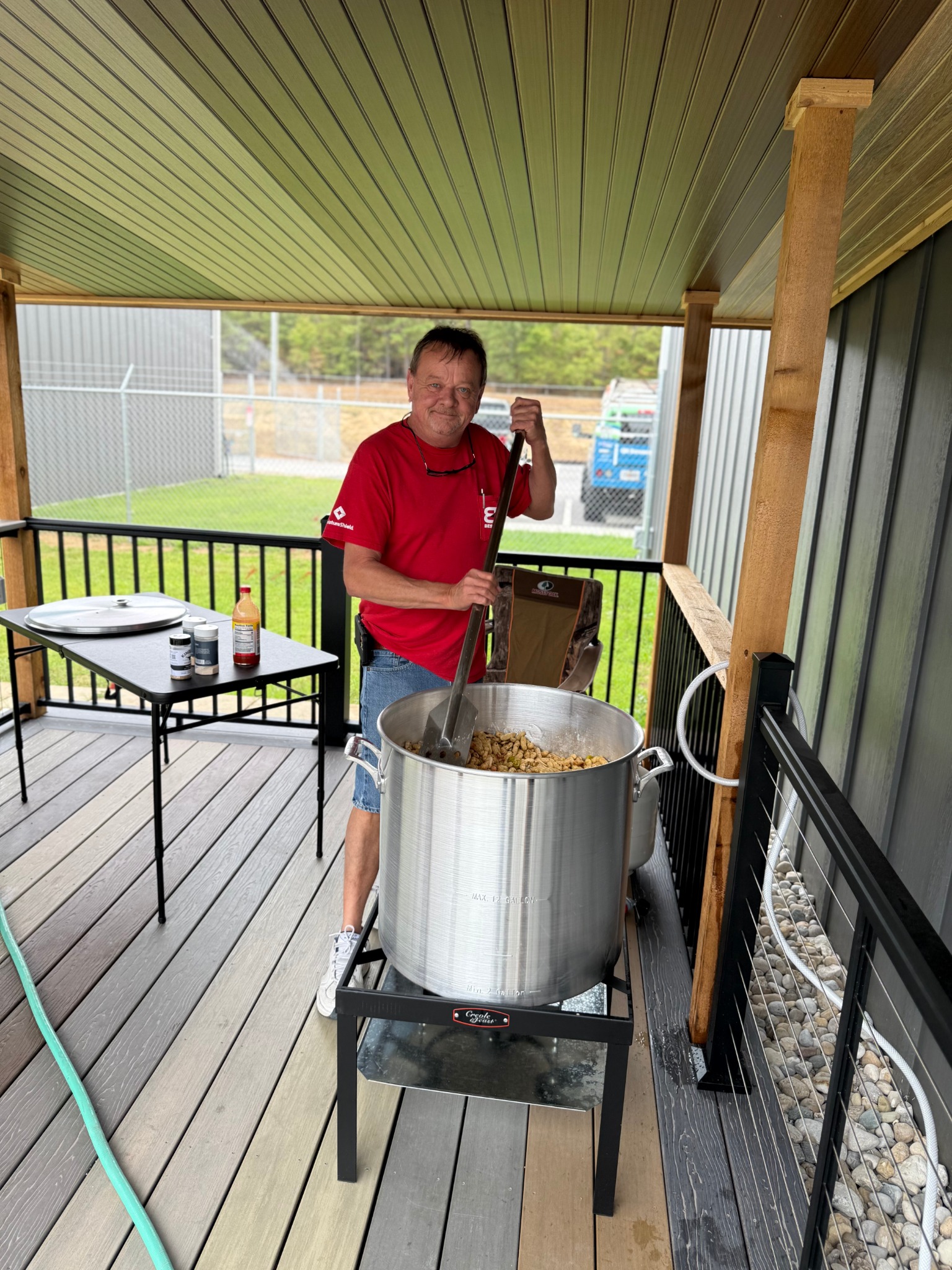 Owner Don Hollomon cooking at a Best Builders Supply gathering