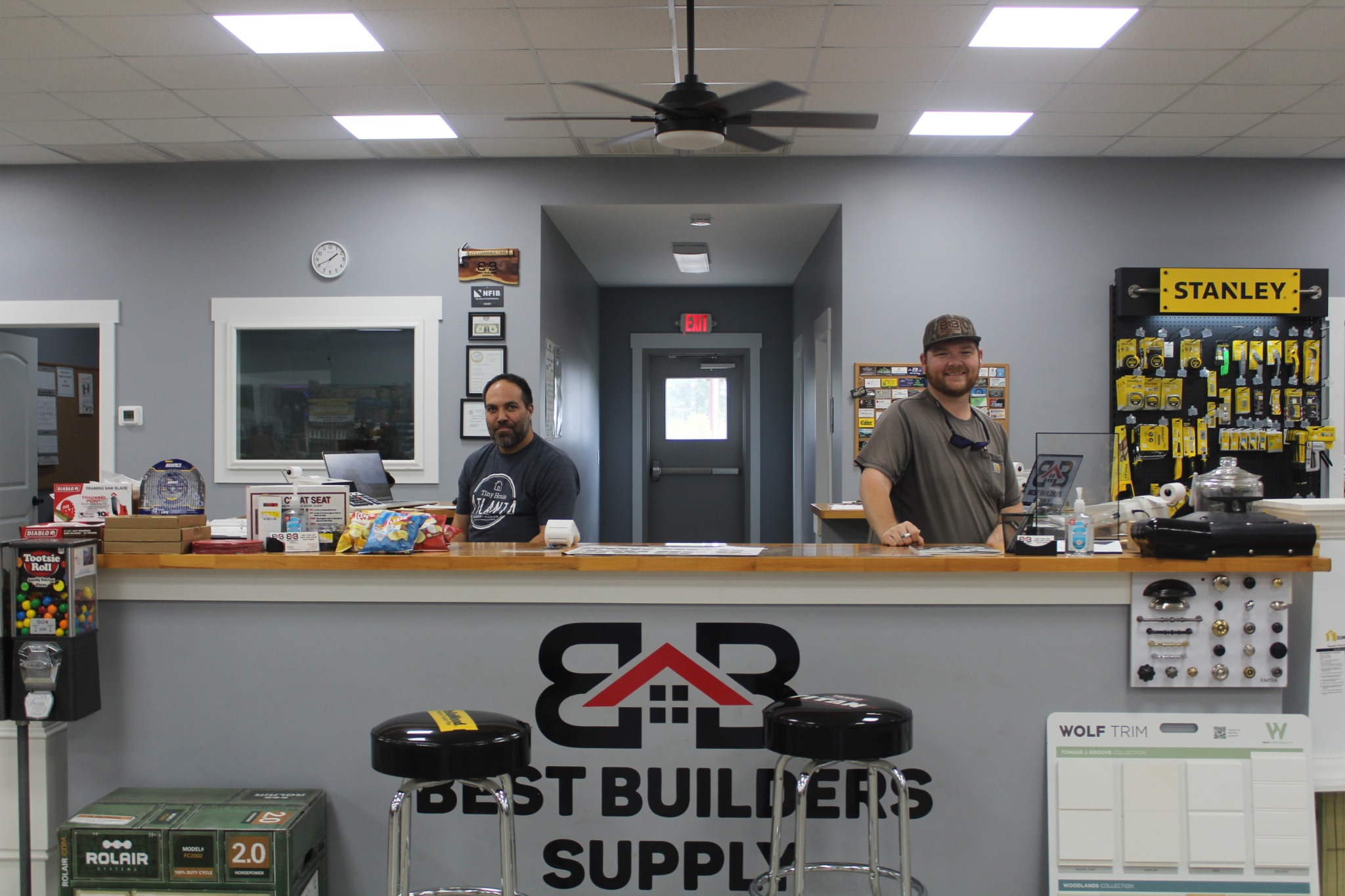 Craig and Mike behind the Best Builders Supply sales counter